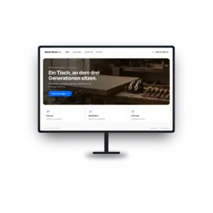 Monitor mit der Startseite einer Handwerks-Website